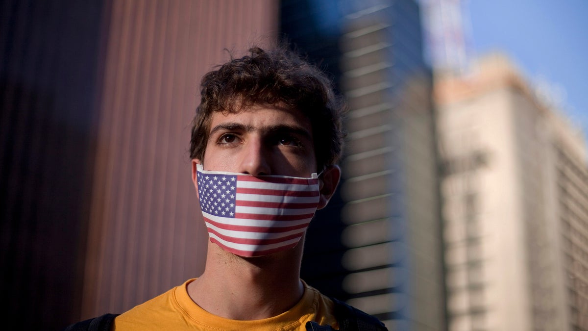  A protester in Sao Paulo, Brazil, is shown protesting in July 2013 against their government's rejection of the asylum application of Edward Snowden, who leaked top-secret documents about sweeping U.S. surveillance programs. (AP Photo/Andre Penner, file) 