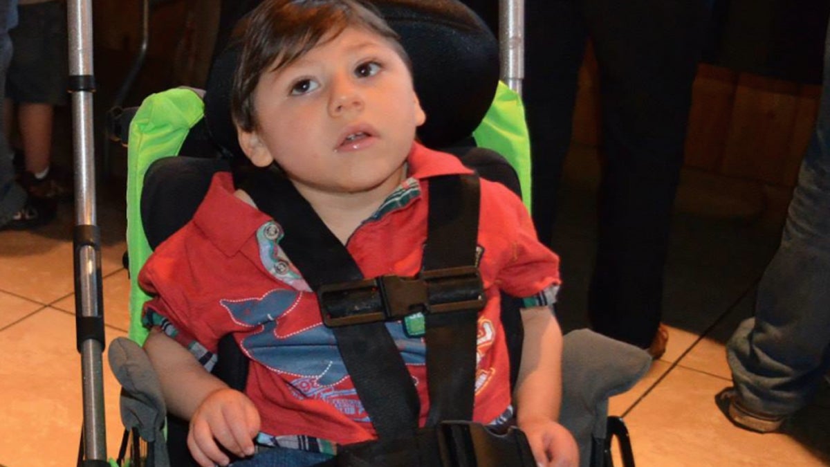  Four-year-old Nicholas Lovecchio is seated in the wheelchair that police say was stolen from outside his Brookhaven home. (Image via gofundme.com/wheelchair4nicolas) 