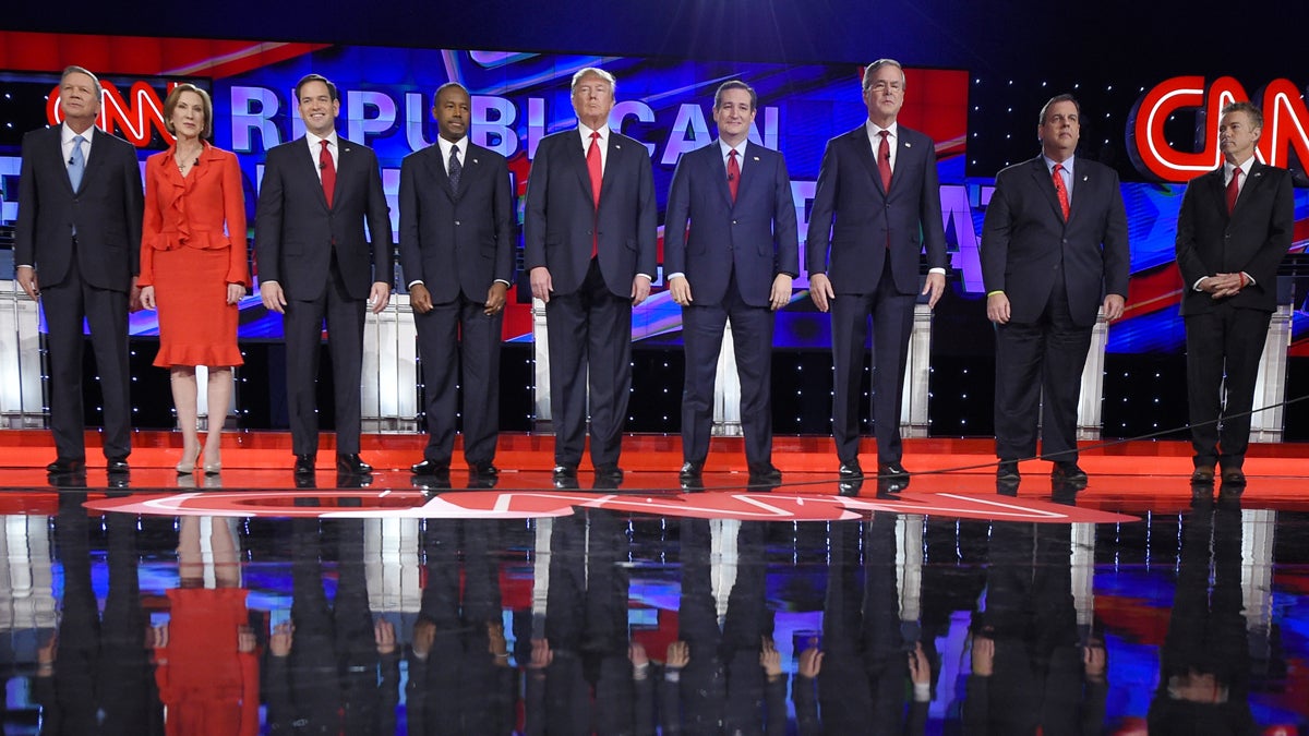  From left: Republican presidential candidates John Kasich, Carly Fiorina, Marco Rubio, Ben Carson, Donald Trump, Ted Cruz, Jeb Bush, Chris Christie, and Rand Paul take the stage during the CNN Republican presidential debate on Tuesday in Las Vegas. (AP Photo/Mark J. Terrill) 