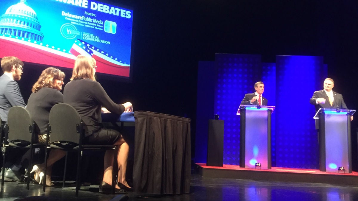 Democrat John Carney (left) debates his Republican opponent Colin Bonini Wednesday night at the University of Delaware. (Zoë Read/WHYY)