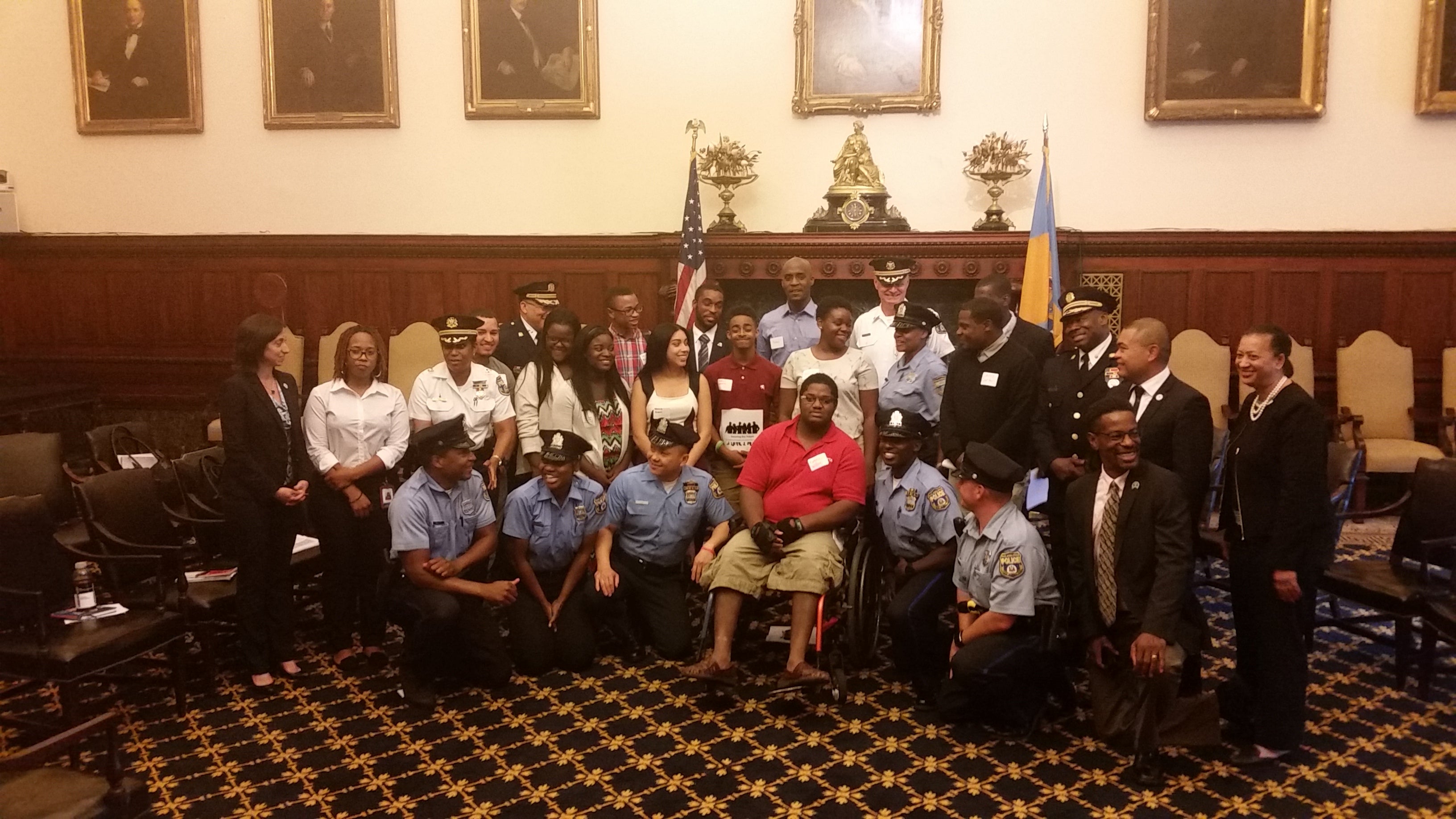  At a City Hall meeting, young people of the city met with Philadelphia police to talk about improving relations between cops and the community. (Tom MacDonald/WHYY) 