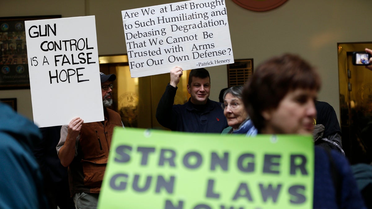  Gun rights and gun control advocates demonstrate in the Pennsylvania Capital building in this January 2013 photo. (Matt Rourke/AP Photo) 