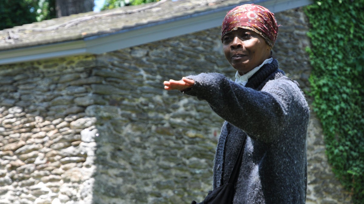 Actress Millicent Sparks performs a monologue as Harriet Tubman at the Johnson House historic site in Germantown for the 2011 Juneteenth National Freedom Day Festival. (Yara Simón for NewsWorks