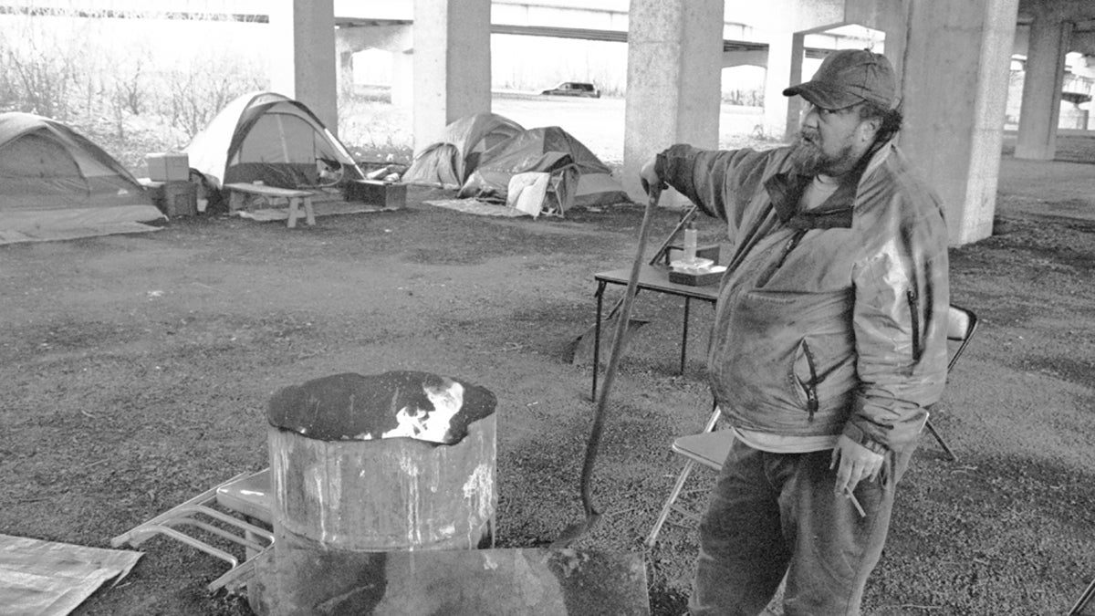  Frank Fairweather camped for three years beneath the Interstate 83 bridge in Harrisburg with at least half a dozen others at any given time. City officials recently closed the encampment. (Image courtesy of Eric Weiss) 