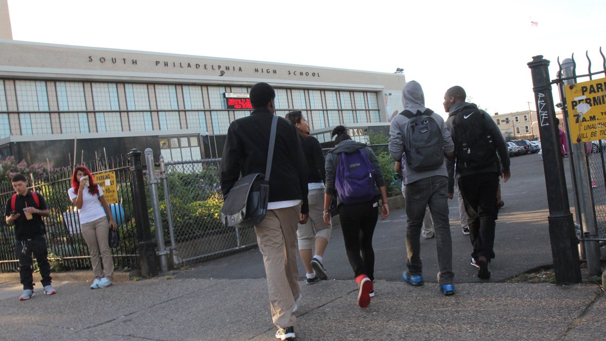 Students trickle into South Philadelphia High School for the first day of the 2013-14 school year. (Kimberly Paynter/WHYY, file) 