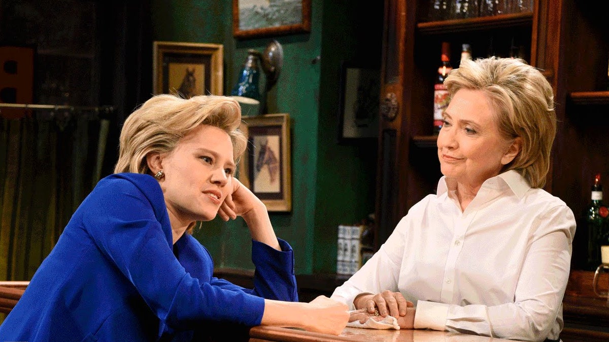  In a scene from a recent episode of 'Saturday Night Live,' the real Hilary Clinton (right) plays a bartender who listens to actor Kate McKinnon's (playing candidate Hillary Clinton) concerns about the presidential race.  