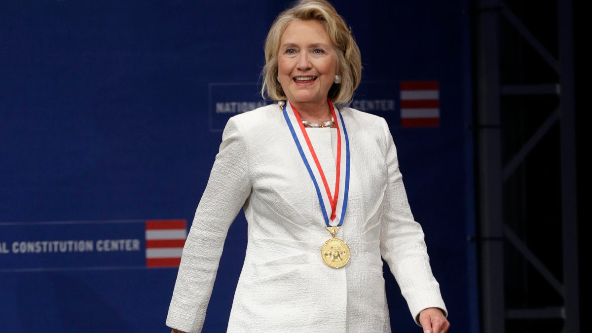  Former Secretary of State Hillary Rodham Clinton is shown on stage after receiving the Liberty Medal during a ceremony at the National Constitution Center, Tuesday, Sept. 10, 2013, in Philadelphia. (AP Photo/Matt Rourke, file) 