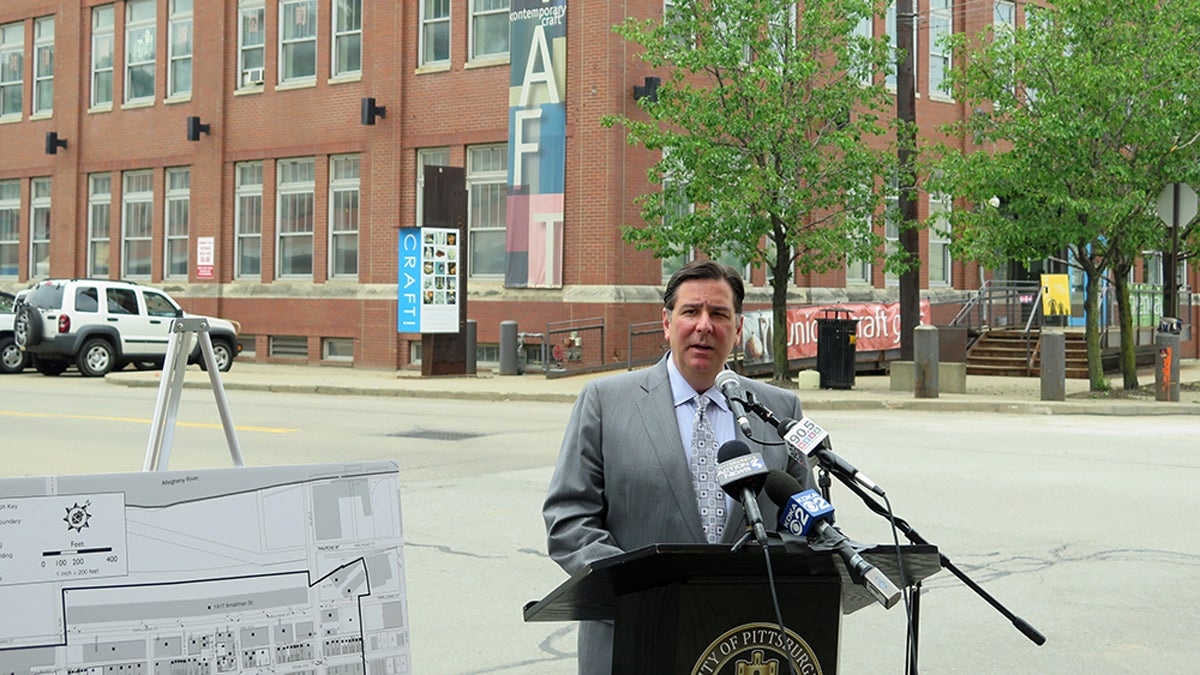  Mayor Bill Peduto announced the naming of Pittsburgh's Strip District as a National Historic District.  (Irina Zhorov /WESA) 