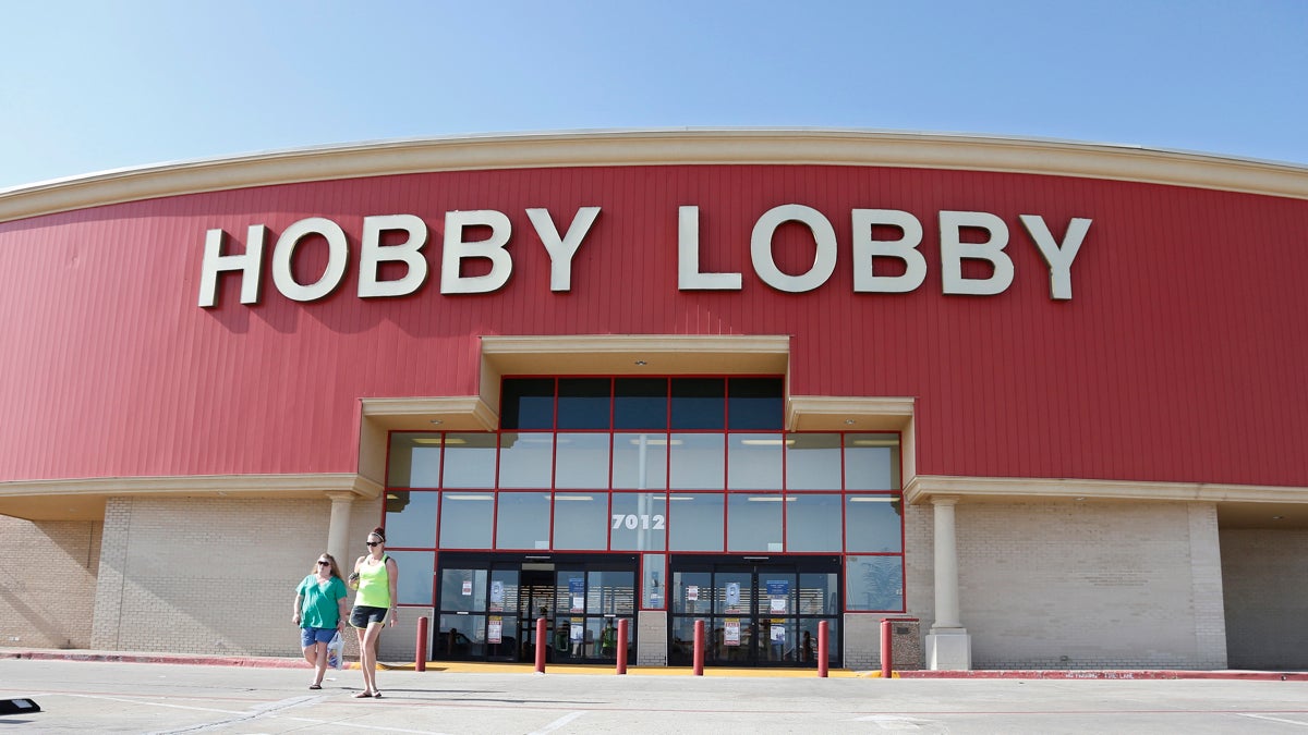  Customers leave a Hobby Lobby store in Oklahoma City. The Supreme Court ruled Monday that employers can hold religious objections that allow them to opt out of the new health law requirement that they cover contraceptives for women. (Sue Ogrocki/AP Photo) 