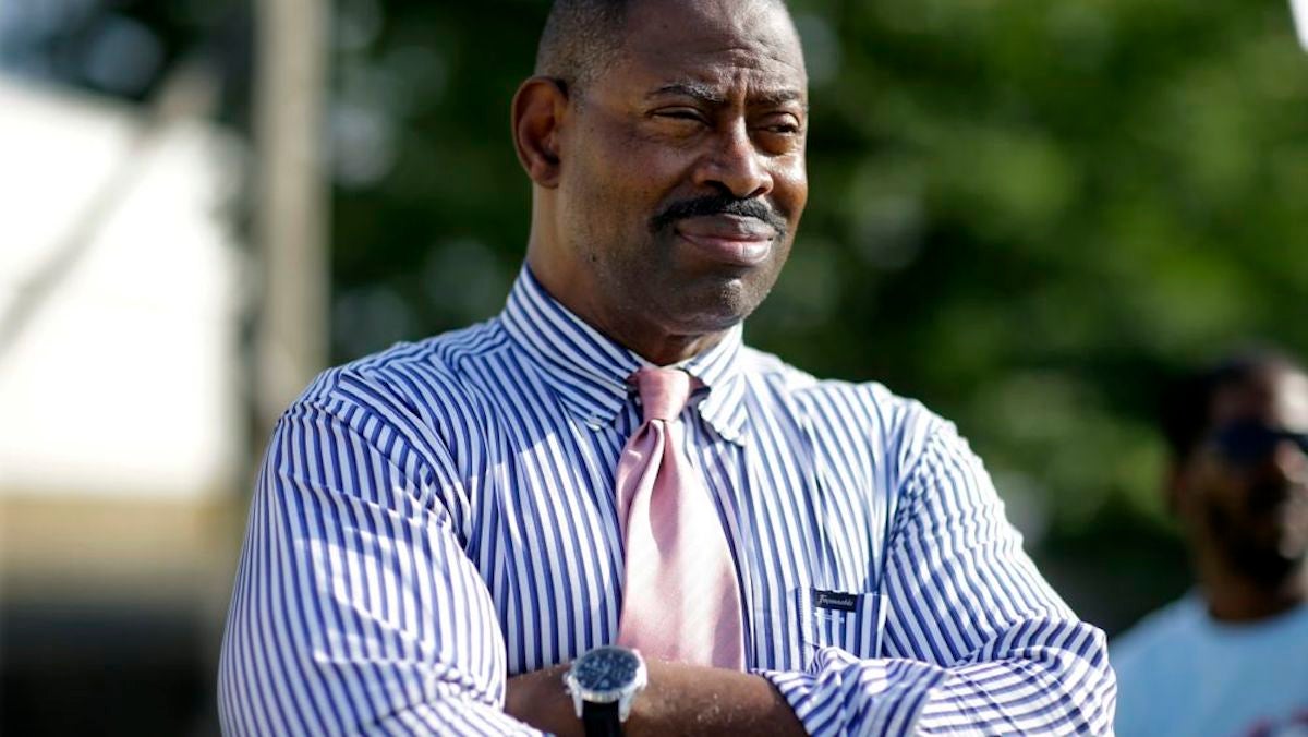 In this photo taken on Monday, Aug. 4, 2014, former Philadelphia Eagles NFL football player Garry Cobb, a Republican Congressional candidate in New Jersey's 1st Congressional District,  listens to a question at a gathering in Cherry Hill, N.J. (AP Photo/Mel Evans)