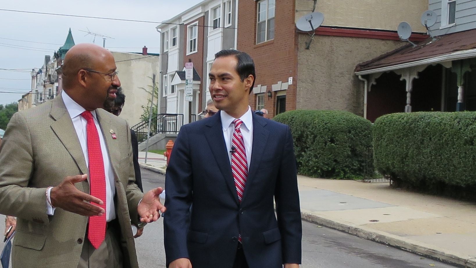  Mayor Michael Nutter and HUD Secretary Julian Castro tour the Mantua neighborhood of West Philadelphia. (Marielle Segarra/WHYY) 