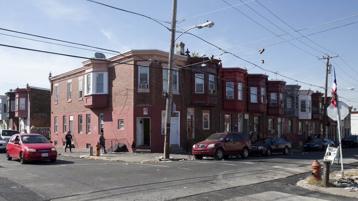  In this Wednesday, Oct. 21, 2015, photo, the intersection of Marshall and Tioga streets in Philadelphia is shown. Drug kingpin Myrna Suren ran a $100,000-a-week cocaine ring centered around this corner in Philadelphia's Hunting Park neighborhood in the 1980s, but is leaving prison soon after her life sentence was cut to 25 years under revised U.S. drug policies. She is one of 6,000 drug offenders leaving prison early this year. (AP Photo/Matt Rourke) 