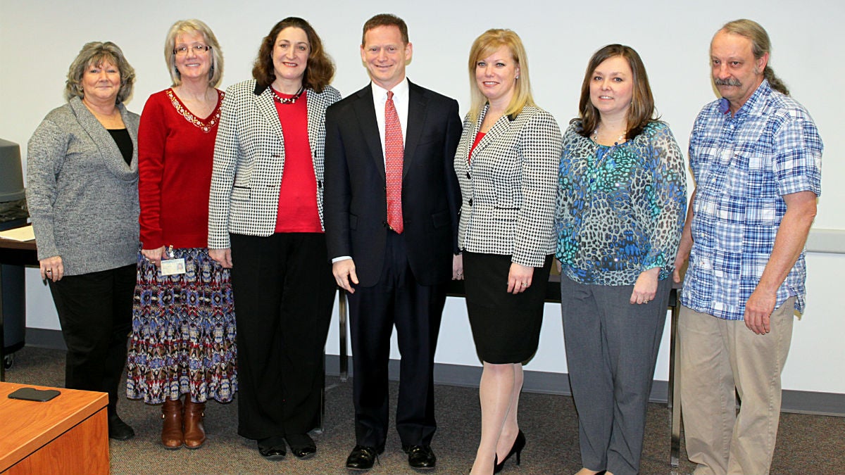  Attorney General Matt Denn (center) poses with members of the IEP Improvement Task Force (Photo courtesy of the Delaware Department of Justice). 