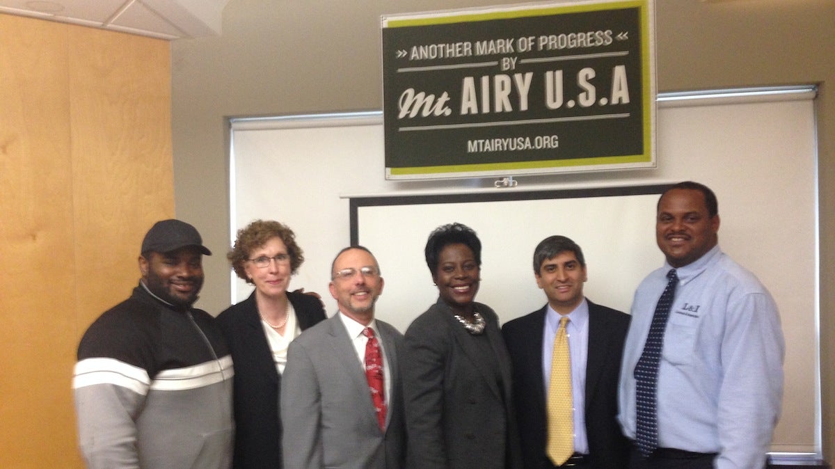  (L to R) Jimmie Reed of Little Jimmie's Bakery and Cafe; Lisa Worden of the Department of Community and Economic Development; David Hyman of Kleinbard Bell & Brecker LLP; State Rep. Cherelle Parker; Anuj Gupta of Mt. Airy USA and Department of Licenses and Inspections Commissioner Carlton Williams (Neema Roshania/WHYY) 