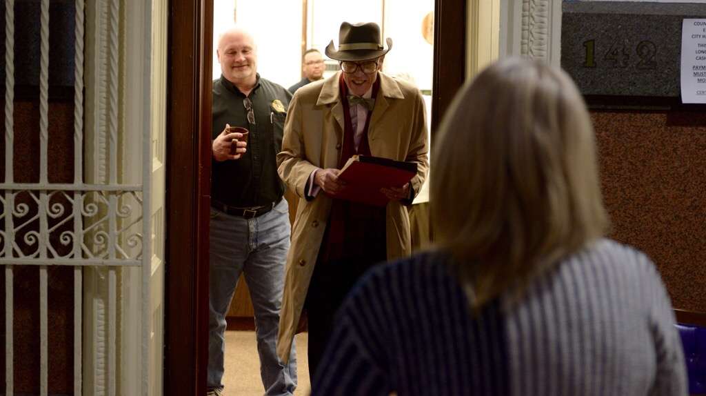  Greg Harvey, representing at-large City Council candidate Alan Domb, is told by Elections Supervisor Tim Dowling that more forms are needed in order to file by Tuesday's deadline. (Bas Slabbers/for NewsWorks) 