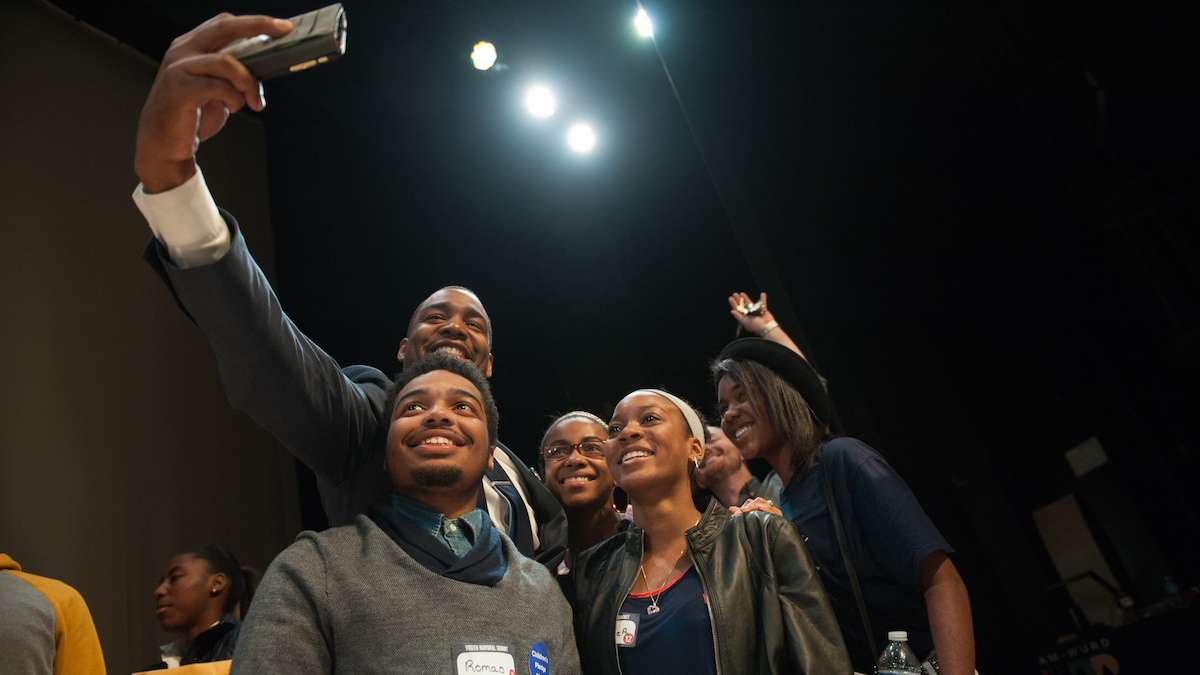  Mayoral candidate Doug Oliver poses for a selfie with students who attended the Youth Mayoral Summit at Venice Island Perfoming Arts Center in Manayunk Saturday afternoon. (Tracie Van Auken/for NewsWorks) 