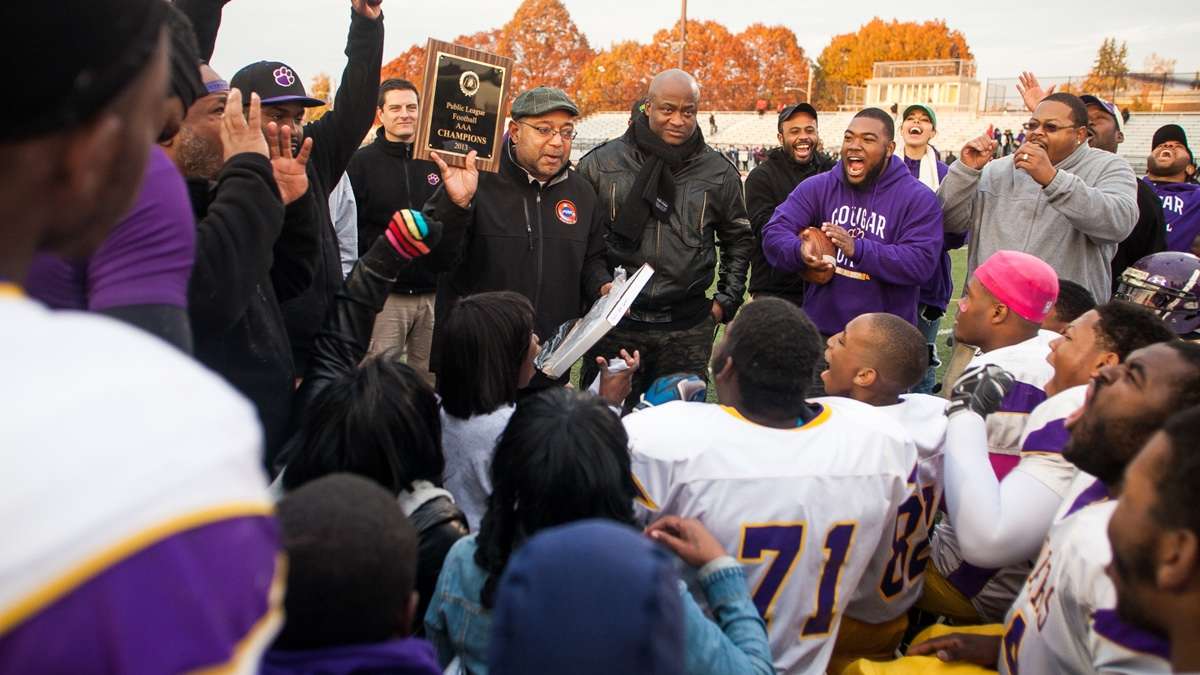  The MLK High Cougars football team celebrated the school's first-ever Public League championship on Nov. 9. (Brad Larrison/for NewsWorks) 