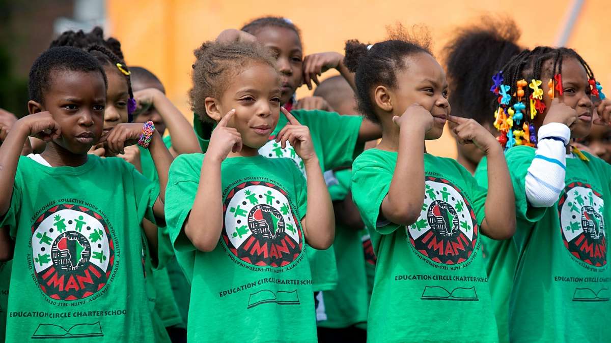  They were smiling at Imani Education Circle Charter School in May, but they still don't know whether the school will open in September. (Bas Slabbers/for NewsWorks) 