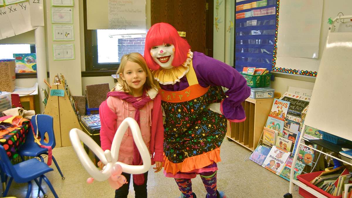 Helena doesn't attend Thomas Mifflin School, but she attended last year's Community Day and got a balloon from 'Taffy the Clown.' (NewsWorks file art)