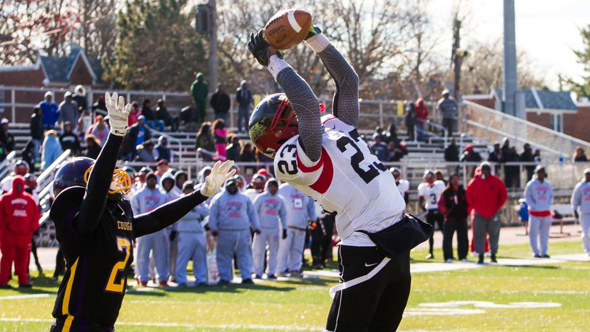  Imhotep Panthers wide receiver DJ Moore makes a great catch in last year's Legacy Bowl game vs. the MLK Cougars. The second-annual game will take place Thursday. (NewsWorks, file art/Brad Larrison) 
