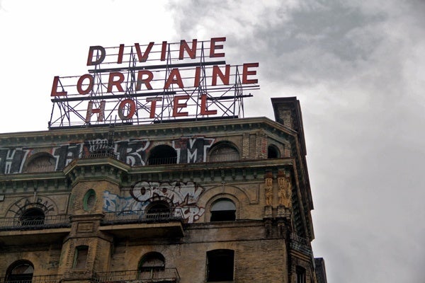  With a grant from Pennsylvania, it appears long-stalled plans fore renovation of the landmark Divine Lorraine Hotelare about to move forward. The hotel is at the center of a  comprehensive plan for revitalizing part of North Broad Street. (NewsWorks file photo) 