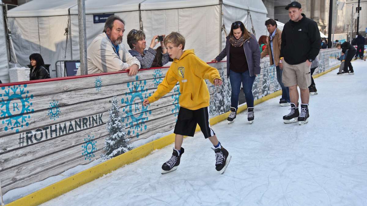  A few skaters at the Rothman Rink in Philadelphia's Dilworth Park wear shorts, illustrating the incongruity of springlike temperatures in December. (Kimberly Paynter/News Works) 