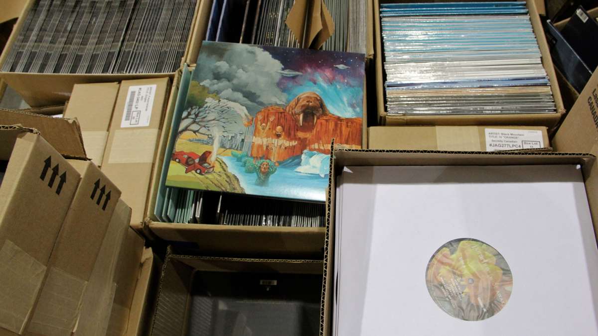 <p>Sean Rutkowski says streaming music led to the revival of vinyl. 'People want something tangible,' he said. (Emma Lee/WHYY)</p>
