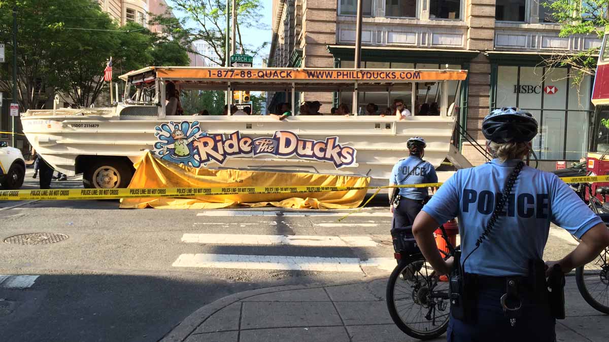  A Ride the Ducks boat full of passengers struck and killed a woman crossing the street in Chinatown Friday afternoon. (Lindsay Lazarski/WHYY) 