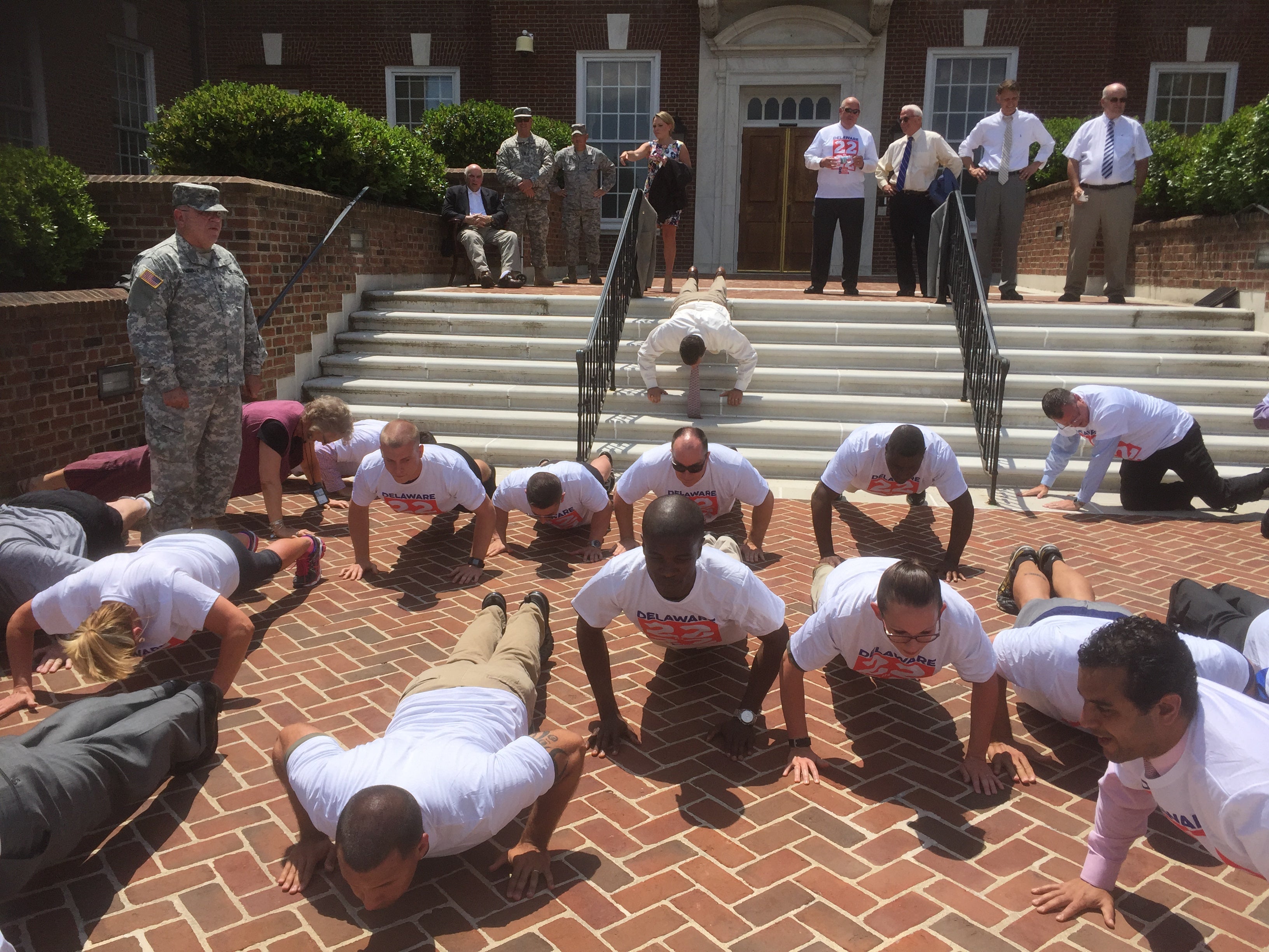 (Newsworks/Zoe Read) The Delaware General Assembly did 22 pushups to raise awareness for veteran suicide.
