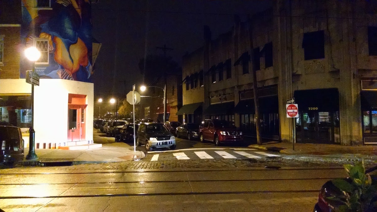  Immediately after the meeting adjourned, several attendees walked down W. Mt. Airy and Germantown avenues. There were no less than four vehicles illegally parked at the intersection at that time. (Daniel Pasquarello/for NewsWorks) 