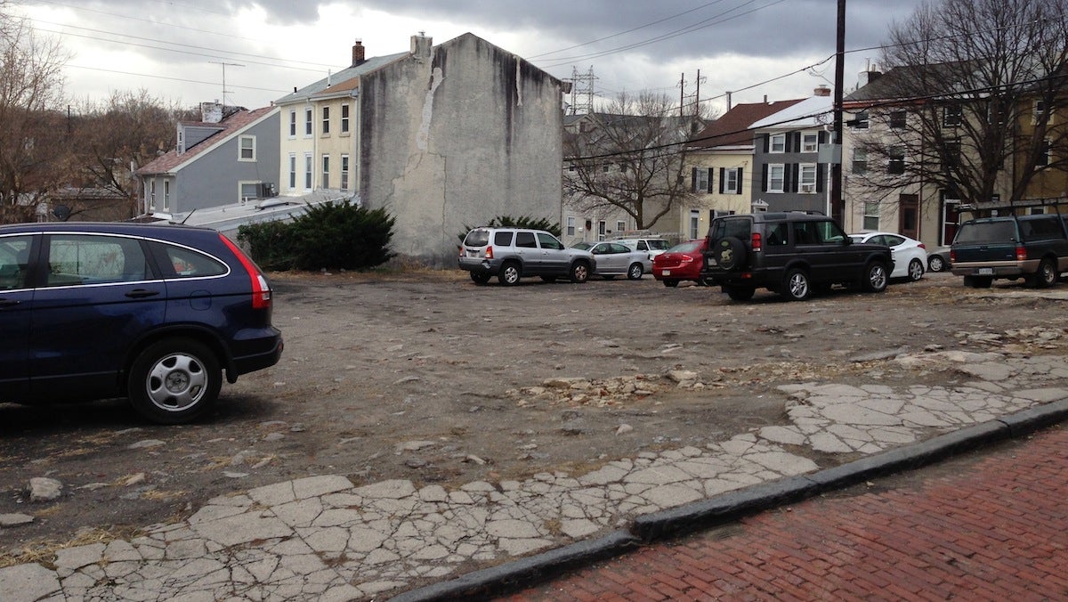  This small lot at 147 Gay Street — which offers spots for 30 vehicles — has become a flash point pitting residents against developers. (Neema Roshania/WHYY) 