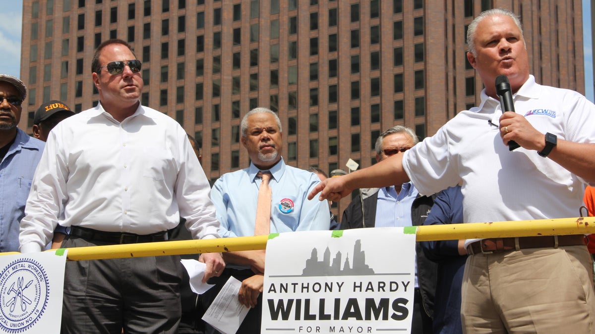  Labor supporters introduce mayoral candidate Anthony Hardy Williams at Thursday's rally in Love Park. (Emma Lee/WHYY) 