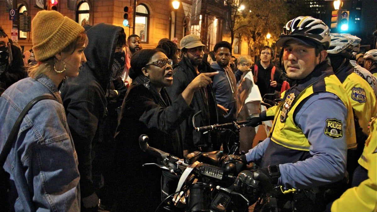 Police and protesters clash at Rittenhouse Square after a winding march through Center City. (Emma Lee/WHYY)