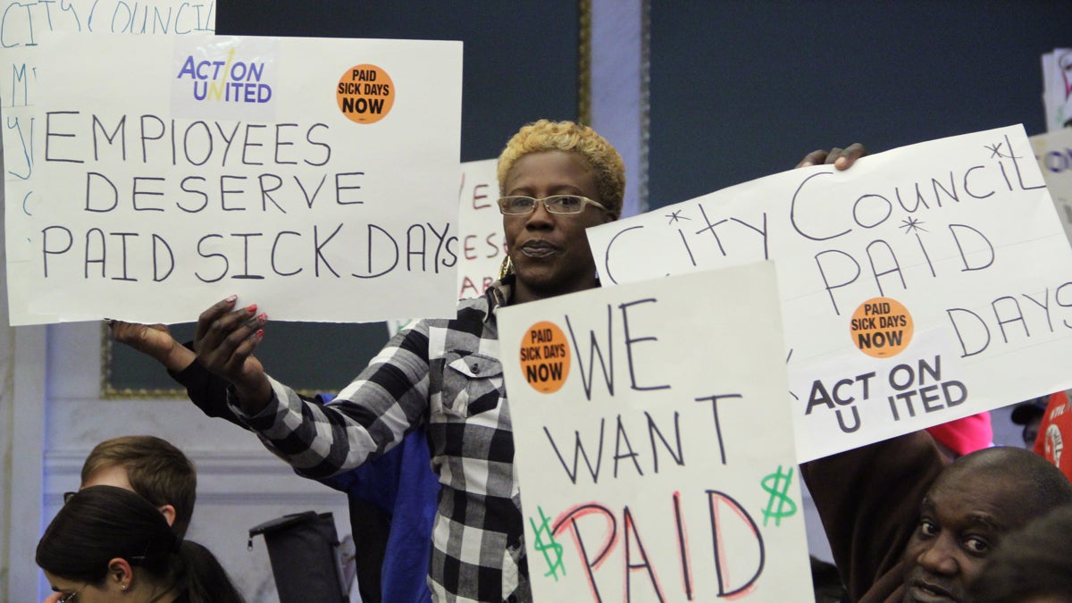  Lisa Hamilton joins a group of about 50 paid sick leave supporters at city hall. (Emma Lee/WHYY) 