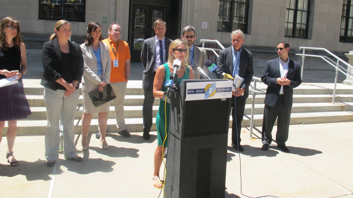  Representatives of transportation, consumer, and environmental groups urge New Jersey officials to find a long-term source of funding for the state’s transportation needs. (Phil Gregory/WHYY) 