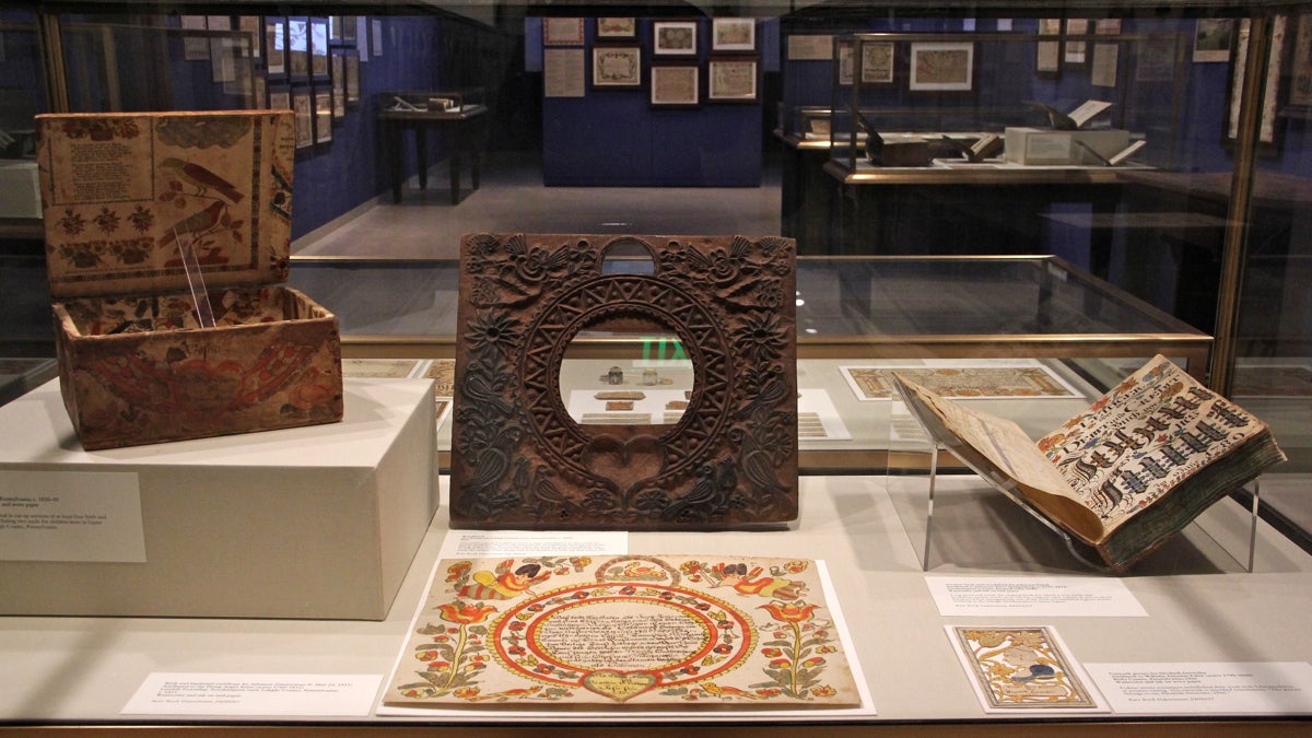 The fraktur collection at the Free Library includes books and artifacts as well as documents. (Emma Lee/WHYY)
