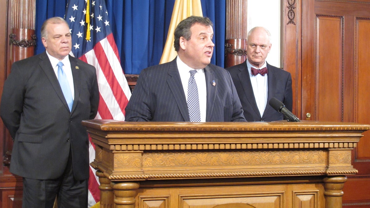  Flanked by New Jersey Senate President Steve Sweeney, left, and Atlantic City Mayor Don Guardian, Gov. Chris Christie  announces plans for the state to take control of Atlantic City finances. (Phil Gregory/WHYY) 