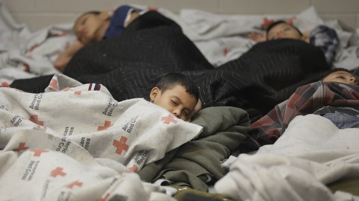  Detainees sleep in a holding cell at a U.S. Customs and Border Protection, processing facility in Brownsville,Texas. Immigration courts backlogged by years of staffing shortages and tougher enforcement face an even more daunting challenge since tens of thousands of Central Americans began arriving on the U.S. border fleeing violence back home. For years, children from Central America traveling alone and immigrants who prove they have a credible fear of returning home have been entitled to a hearing before an immigration judge. (AP Photo/Eric Gay, Pool, File) 