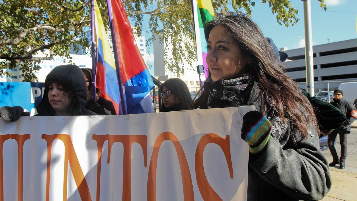 Jasmine Rivera (right) is the lead organizer at Juntos, an organization that fights for Latino immigrants in the Philadelphia area. (Kimberly Paynter/WHYY) 