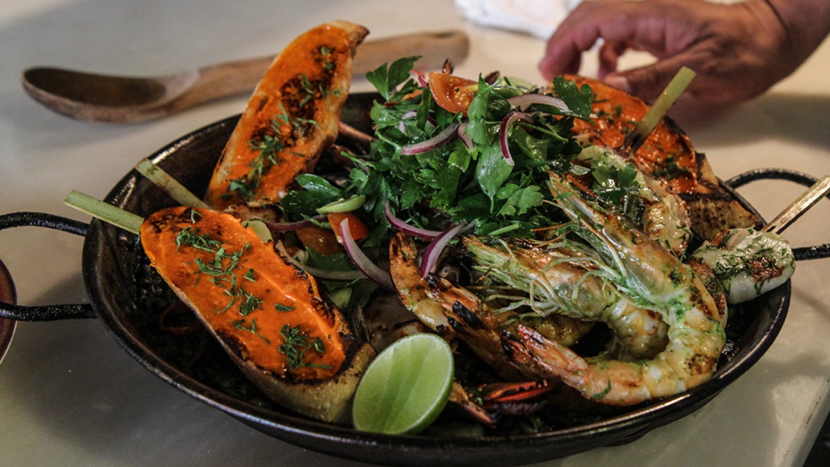  Black squid ink and seafood paella prepared by Chef Jose Garces (Kimberly Paynter/WHYY) 