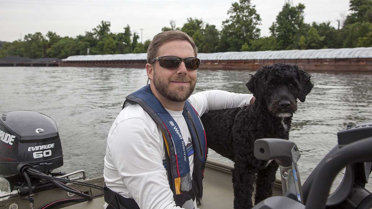  Rob Walters, a Pittsburgh riverkeeper and his dog, Rio. (Irina Zhorov/WESA) 