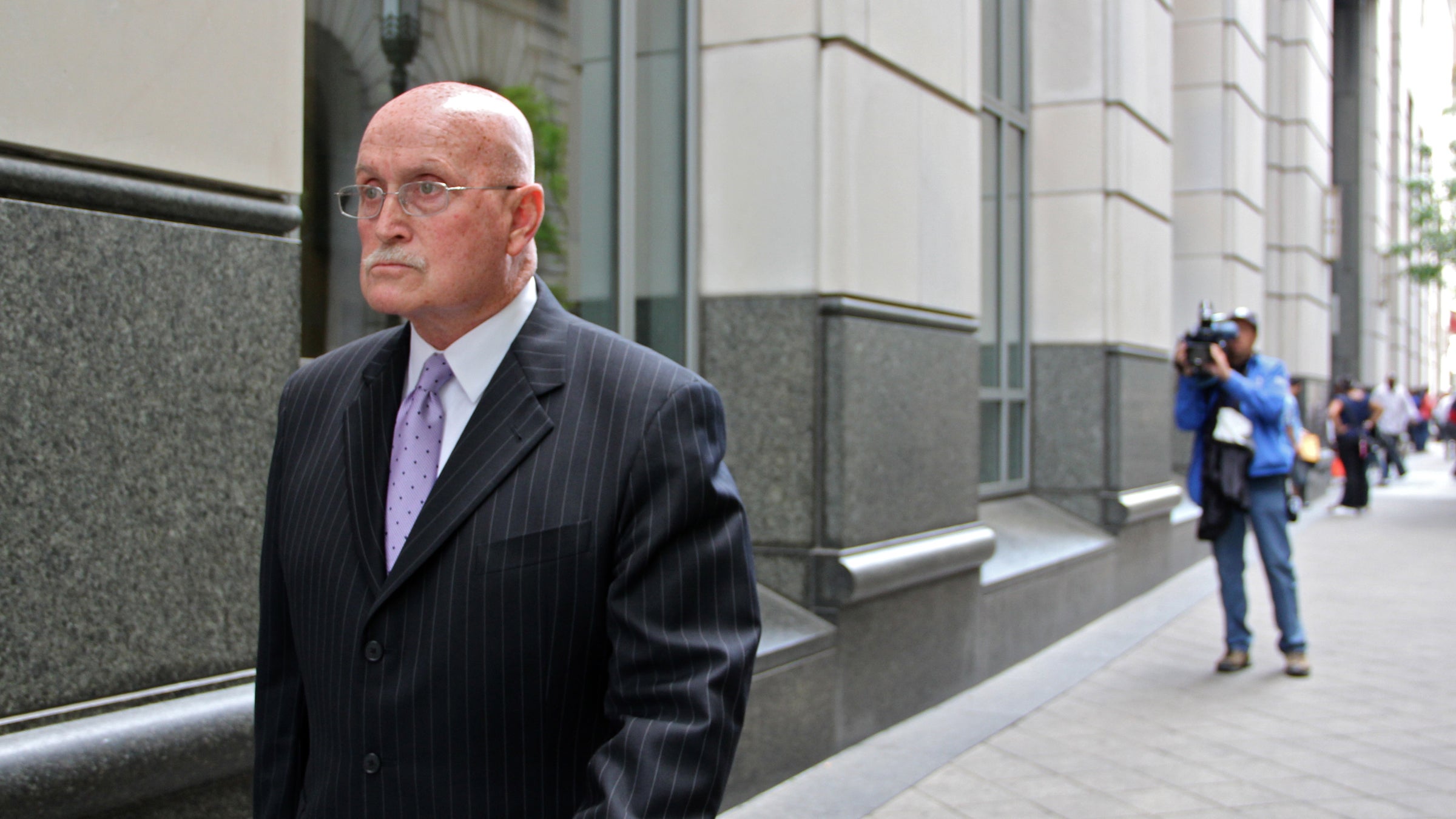  Defense attorney Jack McMahon leaves the Philadelphia Criminal Justice Center. (Emma Lee/WHYY file photo) 