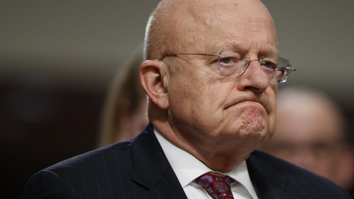 Director of National Intelligence James Clapper listens while testifying on Capitol Hill in Washington