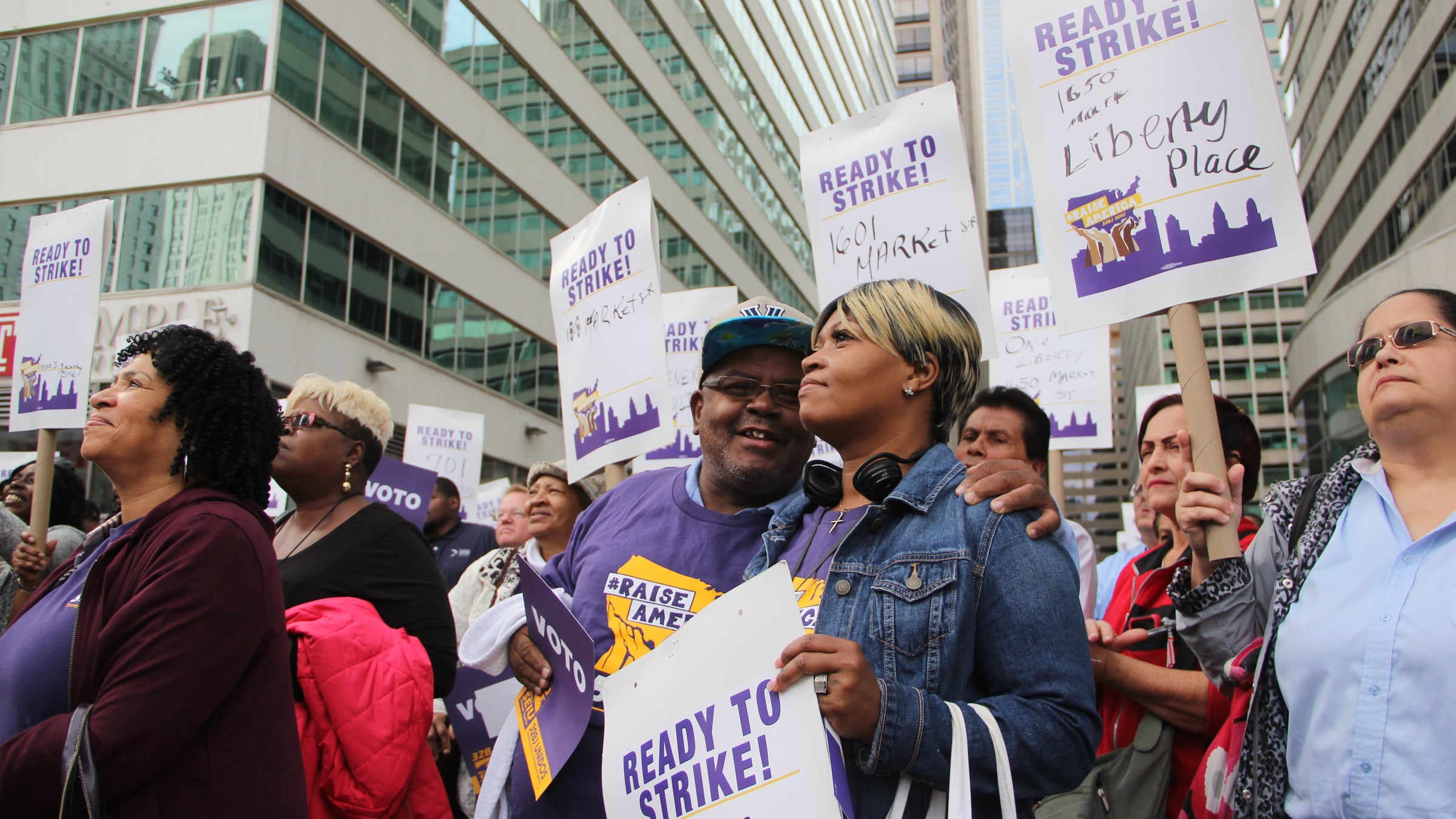  Commercial building cleaners rally near City Hall Tuesday. (Emma Lee/WHYY) 