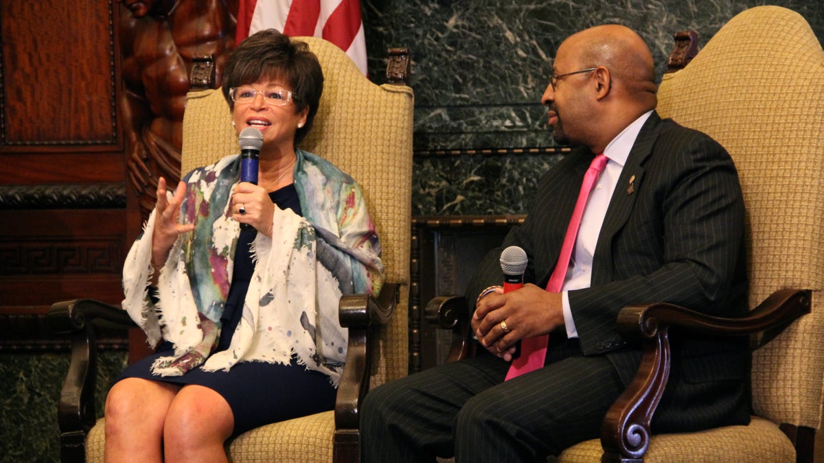  Mayor Michael Nutter, right, and Valerie Jarett, senior adviser to President Obama, talk sick leave in Philadelphia. (Emma Lee/WHYY) 