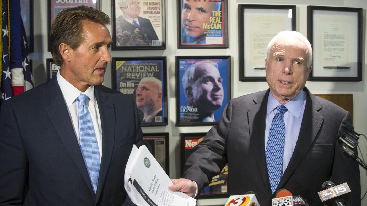 Arizona Sen. Jeff Flake, left, with the state's other senator, John McCain. (Charlie Leight / Associated Press)