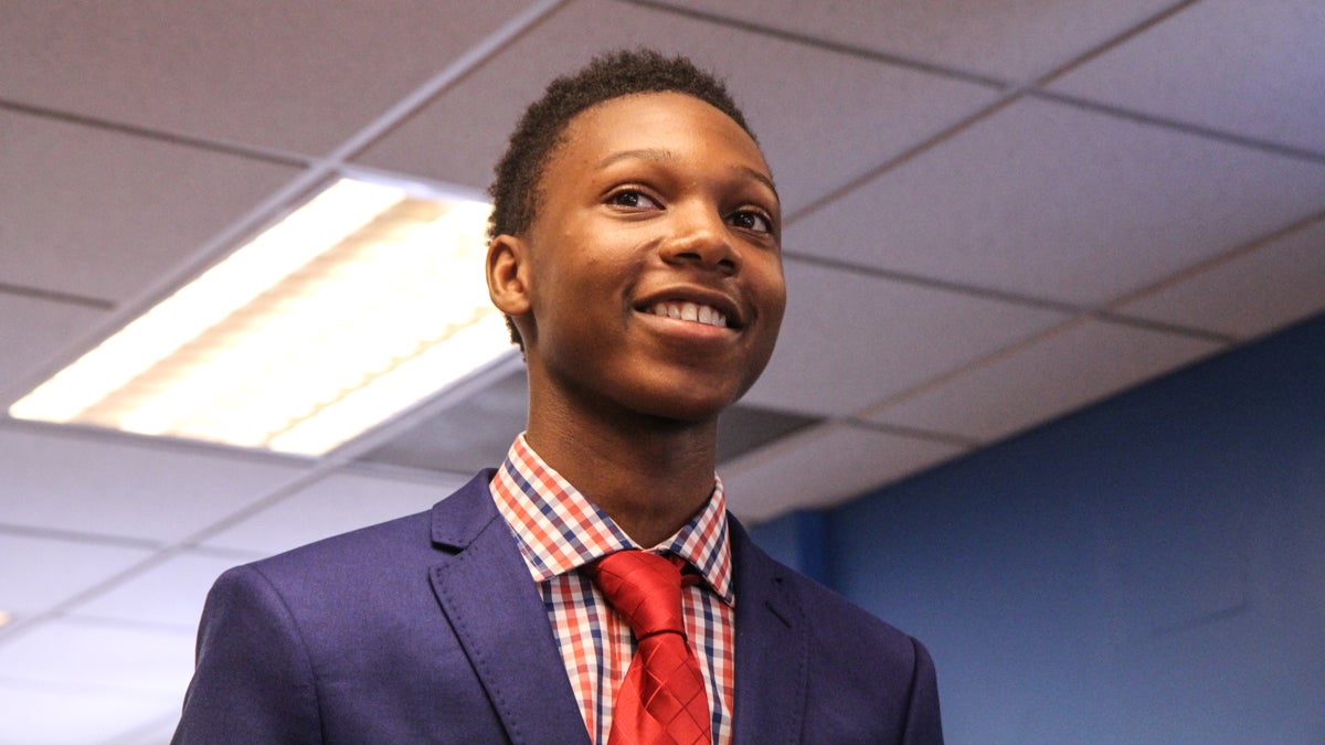  Nasir Mack, 16, has gotten a government-funded summer job for students. He was  recognized at a program announcing additional funding for the summer of 2015. (Kimberly Paynter/WHYY) 