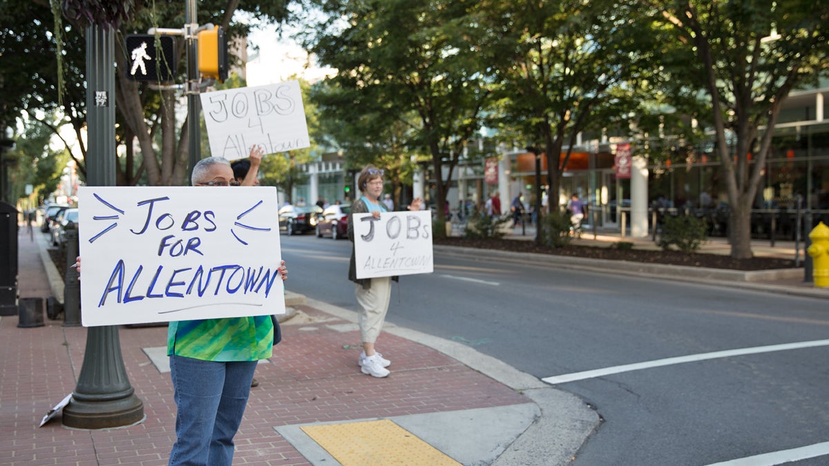  The group Jobs for Allentown rally on Hamilton Street near PPL Corp. on opening night of the new PPL Center in Allentown, Pennsylvania. (Lindsay Lazarski/WHYY)  