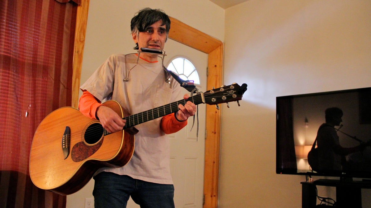  Joe Genaro, better known as Joe Jack Talcum of the Dead Milkmen, performs the folk song Railroad Bill. (Emma Lee/WHYY) 