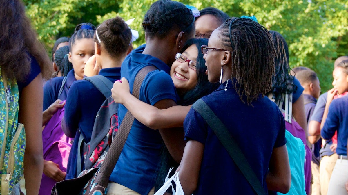 Friends greet each other on the first day of school at C.W. Henry in Mt. Airy last year. (Jana Shea/for NewsWorks) 